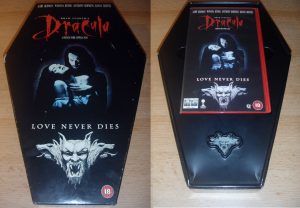 An image of the inside and outside of the VHS special edition of Dracula, in a coffin shaped box