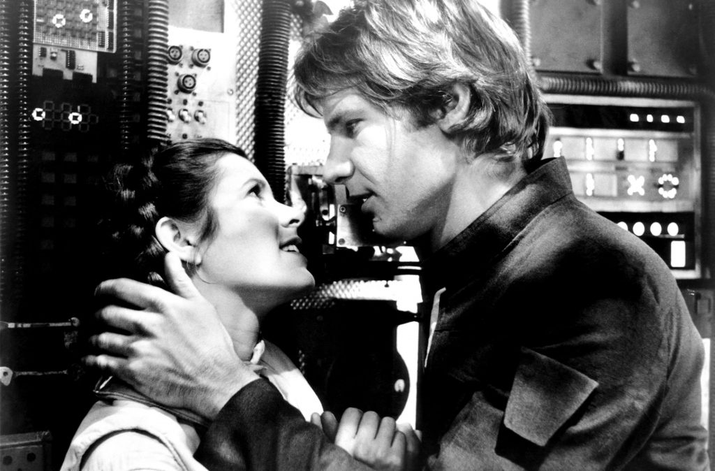Carrie Fisher and Han Solo in a romantic moment in Star Wars